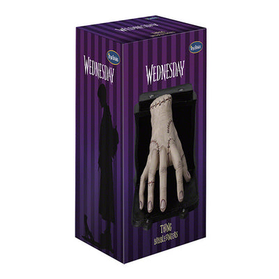 Wednesday Thing Bobblefingers bobblehead featuring a detailed design of Wednesday Adams and Thing, displayed on a shelf among collectibles.