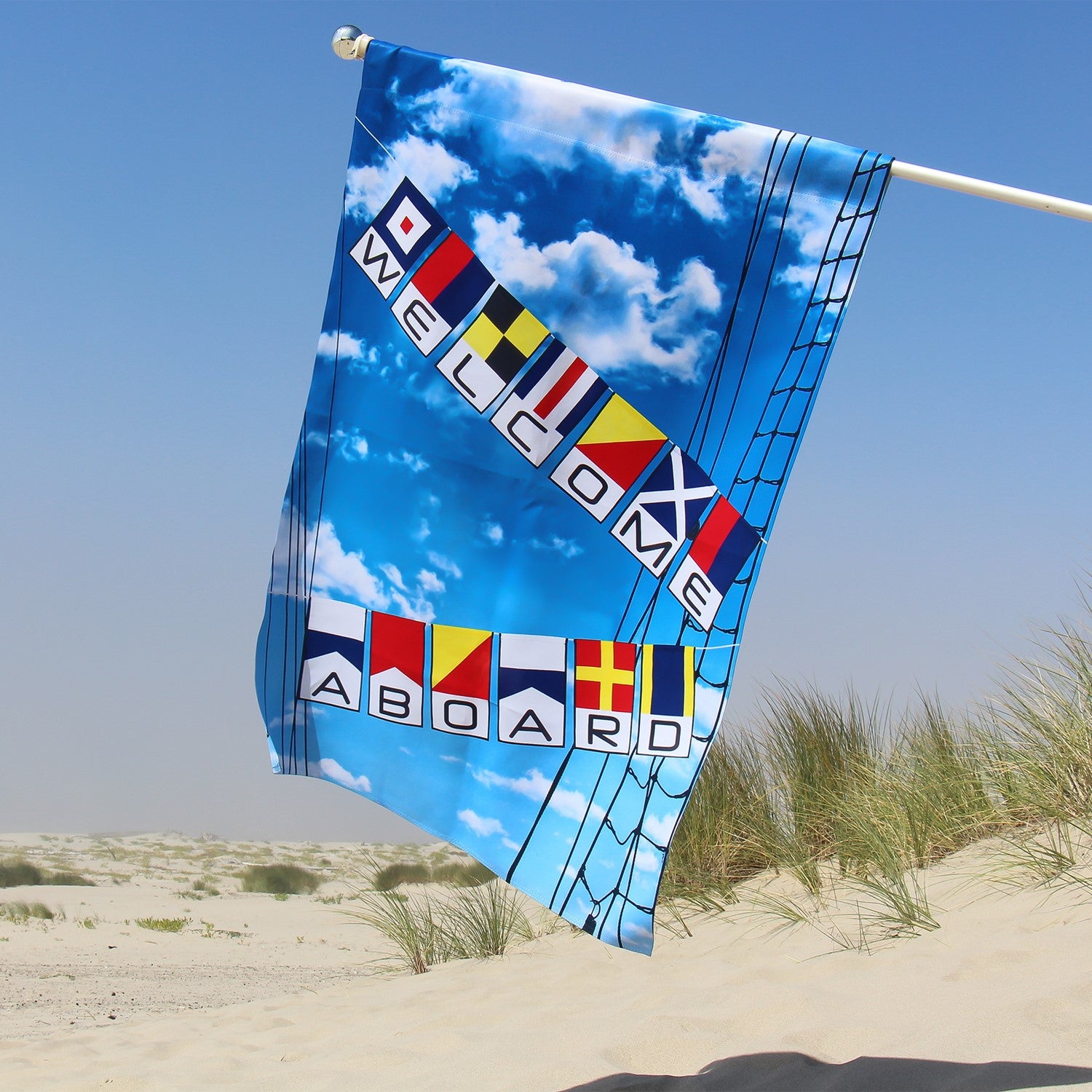 Welcome Aboard Lustre House Banner with double-sided nautical design, displayed on a flagpole in a vibrant outdoor setting.