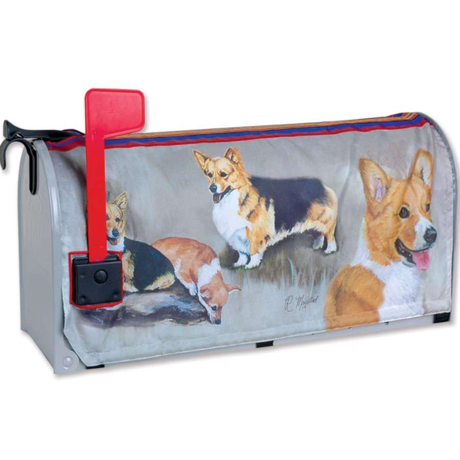 Welsh Corgi mailbox cover featuring colorful print and embroidery design on a standard U.S. mailbox in a garden setting.