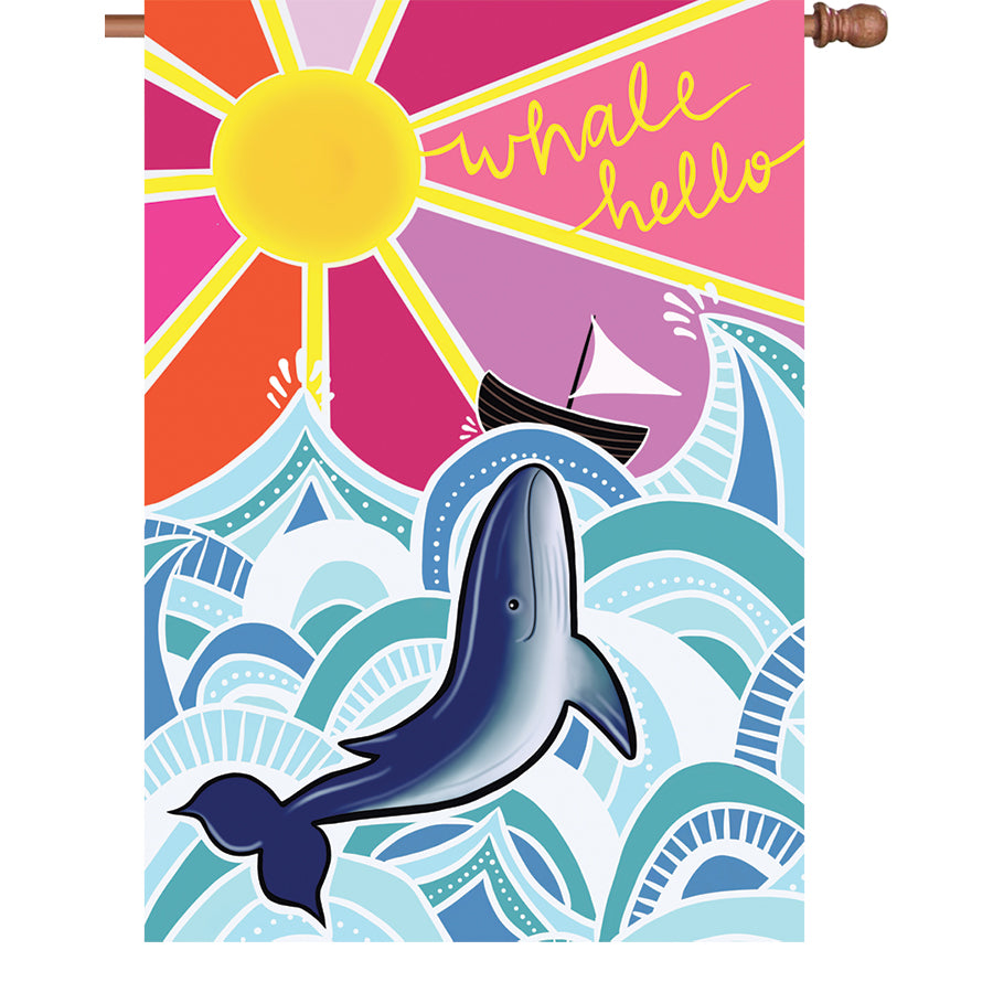 28-inch Whale Hello flags made of PremierSoft fabric, showcasing a whimsical design, displayed on an outdoor flagpole in a sunny garden setting.