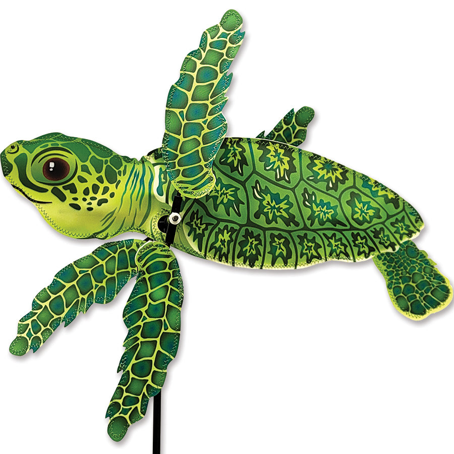 WhirliGig Spinner - 18 in. Baby Sea Turtle in colorful design spinning in a sunny garden, showcasing its whimsical outdoor charm.