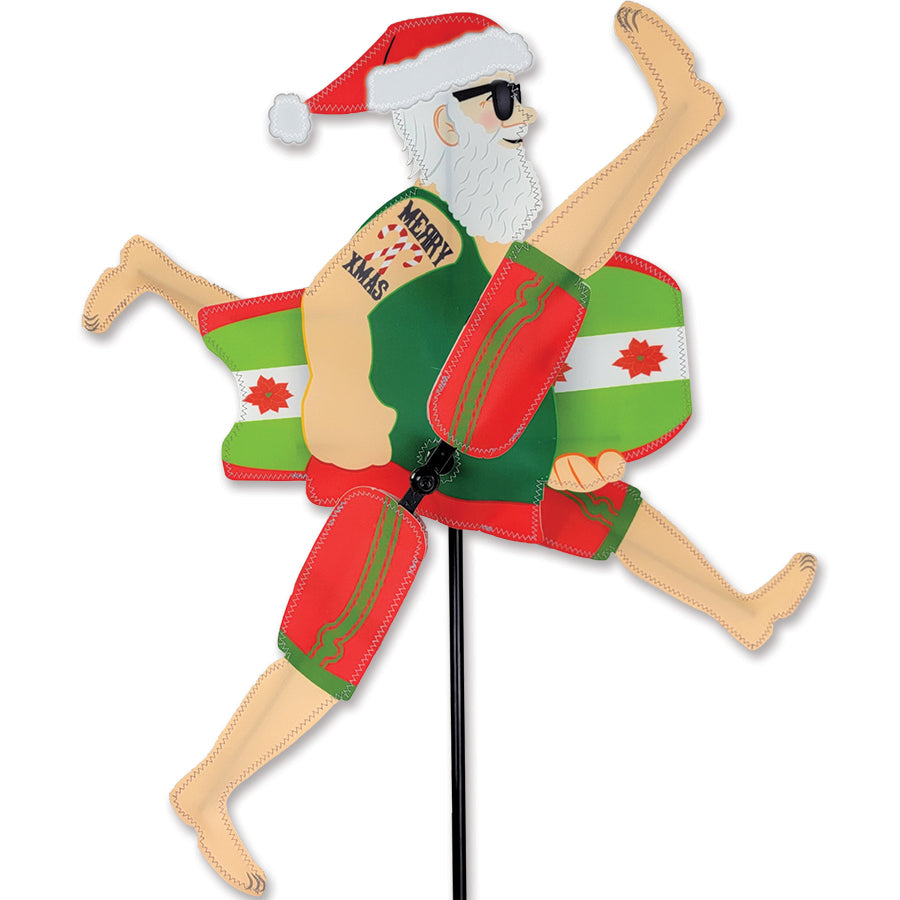 WhirliGig Spinner Beach Santa decoration featuring Santa on a boogie board, vividly colored, spinning in a gentle outdoor breeze for holiday cheer.