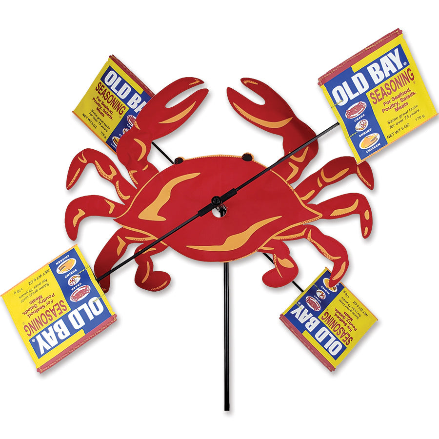 Large Old Bay Crab Red Whirligig Spinner made of durable SunTex fabric, spinning in the yard with a playful crab design.