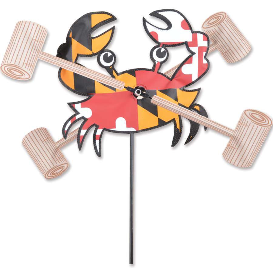 WhirliGig Spinner 12 in. featuring a colorful Maryland crab design spinning in a gentle breeze in an outdoor garden setting.