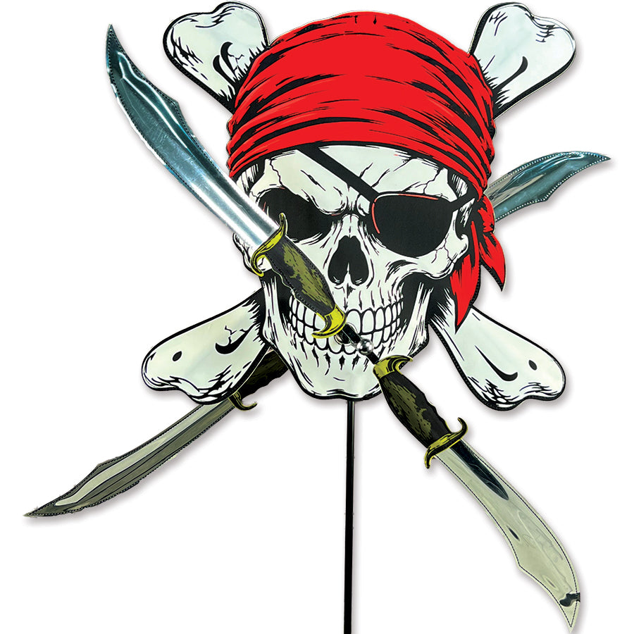 WhirliGig Spinner - Pirate Skull with vibrant design and spinning swords displayed in a garden setting, showcasing its whimsical charm.
