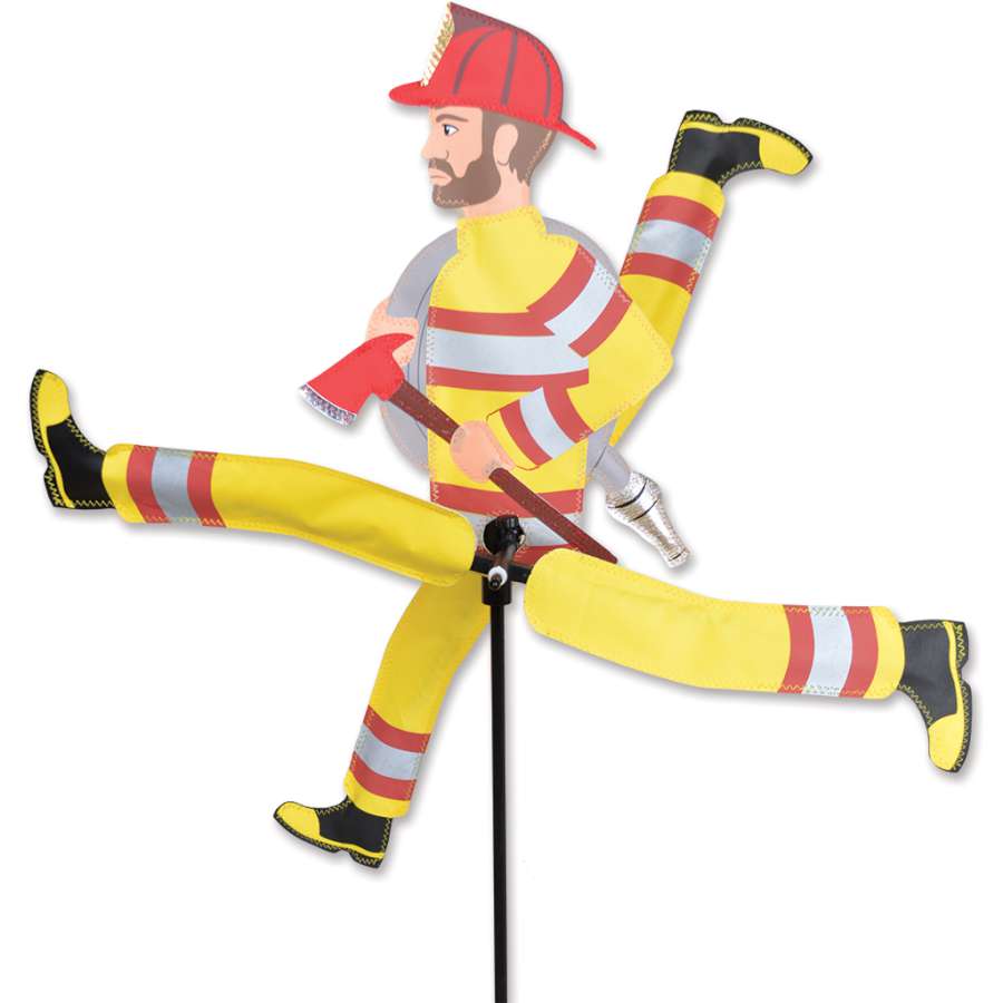 WhirliGig Spinner featuring a 23-inch running fireman design, spinning delightfully in a garden setting, showcasing vibrant colors and movement.