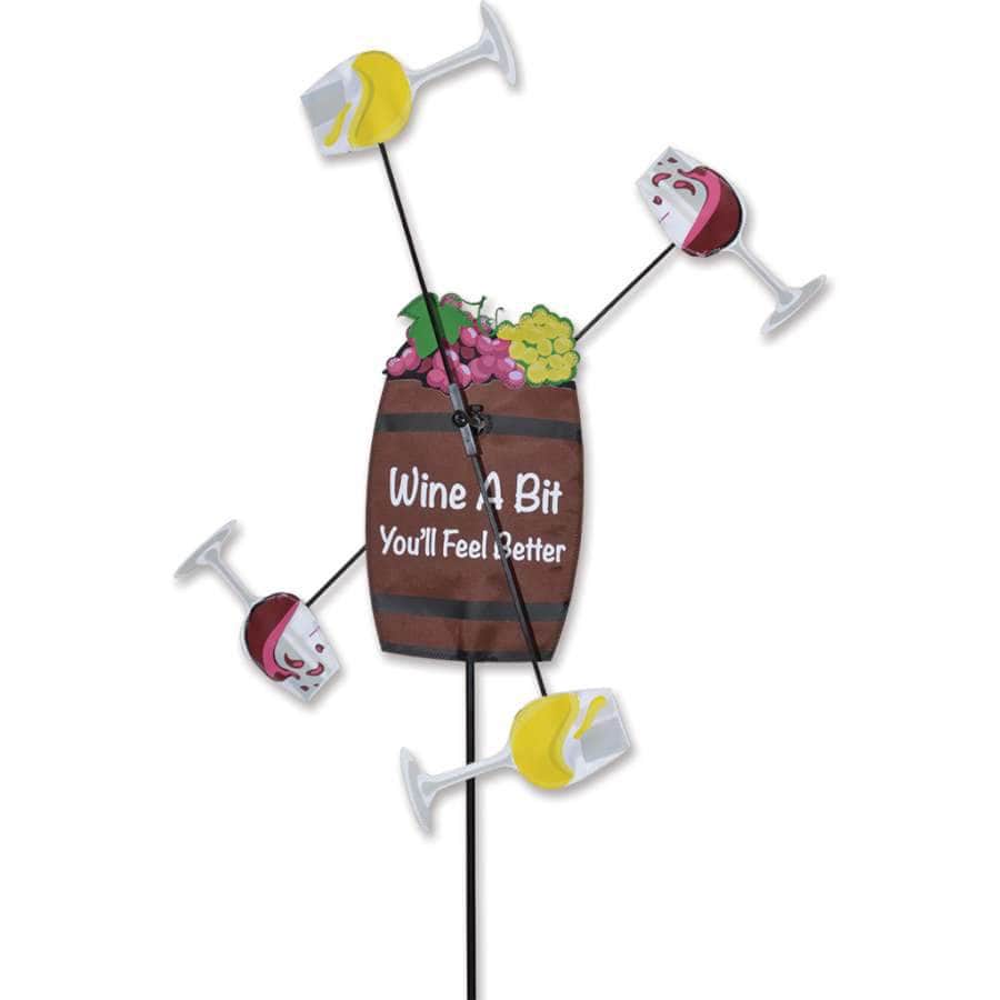 Wine A Bit More spinner with colorful applique, spinning arms, and cheeky outdoor style—perfect for wine lovers’ garden or yard displays.