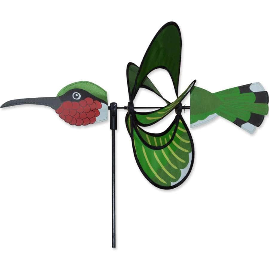 Hummingbird spinner with detailed applique and fluttering wings, made from rip-stop fabric for graceful, wind-powered garden movement.