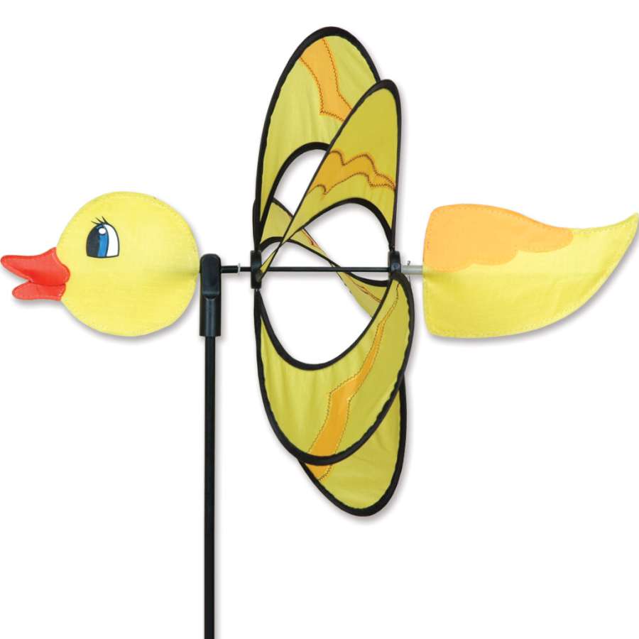 Whirly Wing Spinner in Yellow Duck design spinning gracefully in a vibrant garden setting, enhancing outdoor decor.