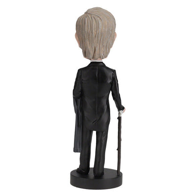 William Henry Harrison bobblehead showcasing detailed features and vintage attire, celebrating the ninth U.S. President in a vibrant display.