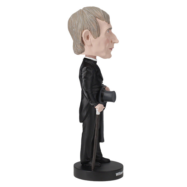 William Henry Harrison bobblehead showcasing detailed features and vintage attire, celebrating the ninth U.S. President in a vibrant display.