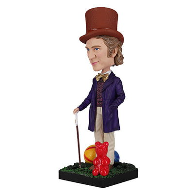 Willy Wonka Bobblehead featuring a whimsical character with a top hat and purple suit, beautifully displayed on a shelf.