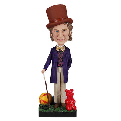Willy Wonka Bobblehead featuring a whimsical character with a top hat and purple suit, beautifully displayed on a shelf.
