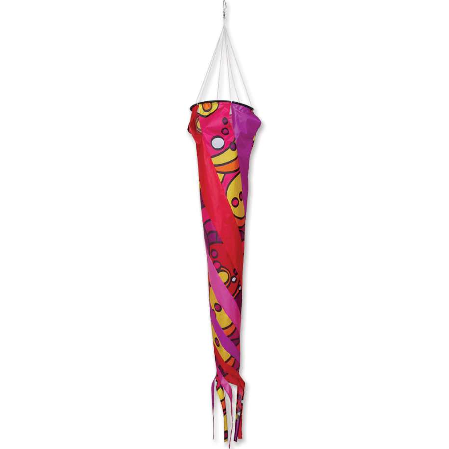 Wind Turbine 150 - Warm Orbit featuring vibrant colors, spinning in a garden setting, enhancing the atmosphere with movement.