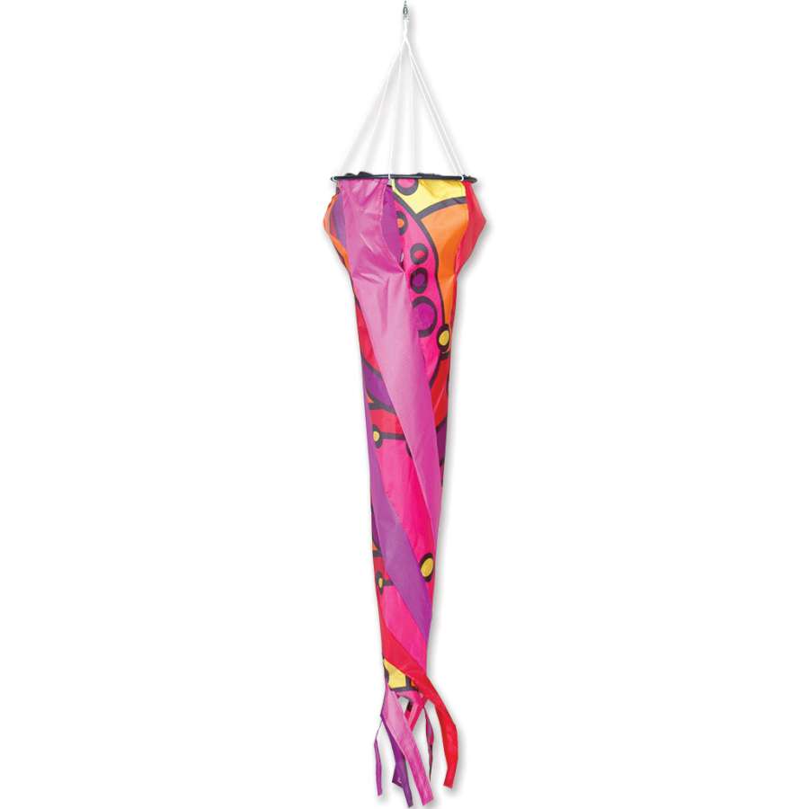 Wind Turbine 90 - Warm Orbit, a 90 cm colorful rotating accessory, displayed in the sky above a kite in flight, showcasing dynamic movement and vibrant colors.