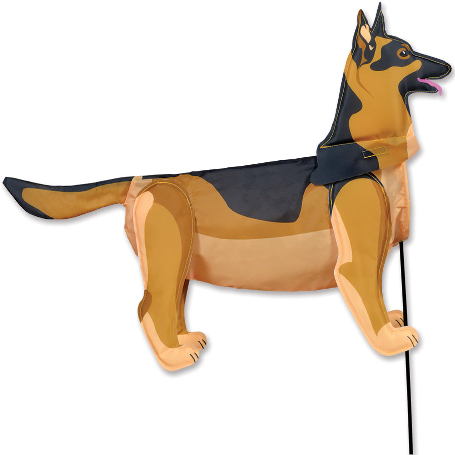 Windicator - German Shepherd weather vane with vibrant 3-D design, swaying in the wind, set against a colorful outdoor garden backdrop.