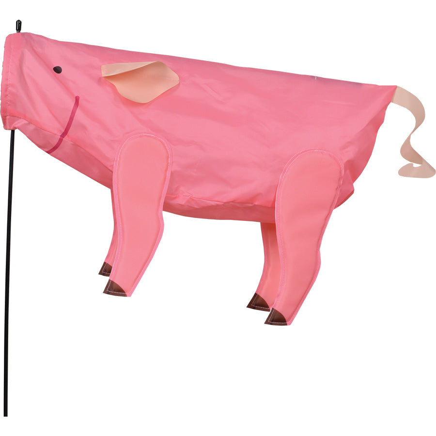 Windicator - Pig animated garden weather vane inflating in the wind on a sturdy pole, adding vibrant character to an outdoor setting.