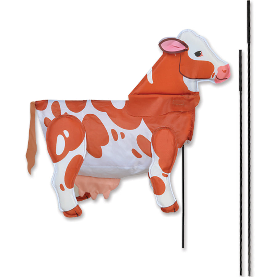 Windicator Recumbent Bike Flag - Brown Cow inflated in the breeze, mounted on a bike showcasing its playful design and vibrant colors.