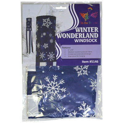 Winter Wonderland 40-inch windsock featuring a snowflake design in blue and white, gently fluttering outdoors in the winter breeze.