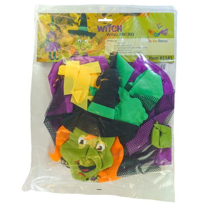 Witch Wind Friend 3D windsock design featuring a witch and frog, hanging outdoors in a colorful garden setting, perfect for Halloween.