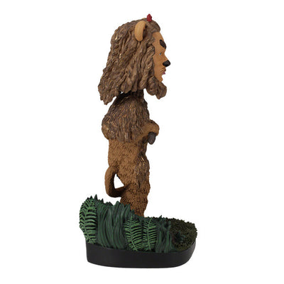 Wizard of Oz Cowardly Lion Bobblehead on a yellow brick road base, showcasing intricate details and vibrant colors, perfect for collectors.