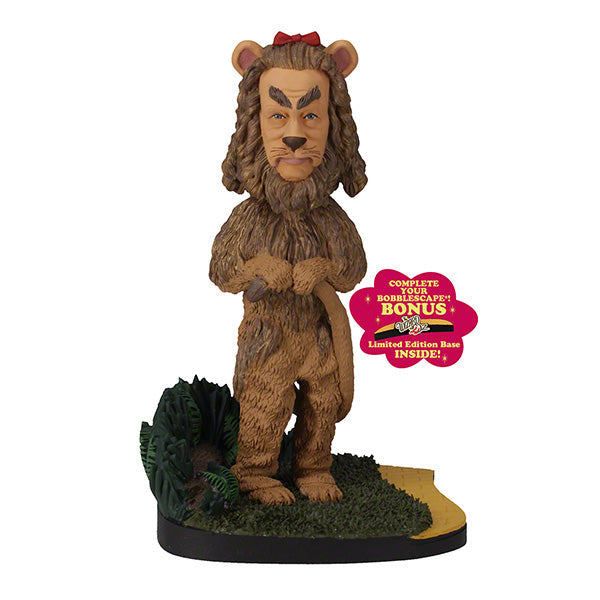Wizard of Oz Cowardly Lion Bobblehead on a yellow brick road base, showcasing intricate details and vibrant colors, perfect for collectors.