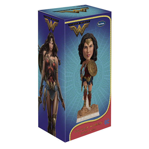 DC: Wonder Woman bobblehead featuring Gal Gadot's likeness, crafted from durable polyresin, showcased on a desk against a neutral backdrop.