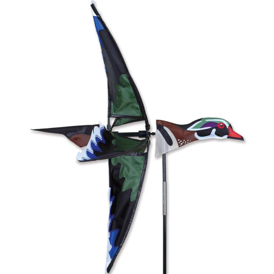 Vibrant Wood Duck Spinner in a garden setting, showcasing lifelike duck design spinning gracefully in the breeze.