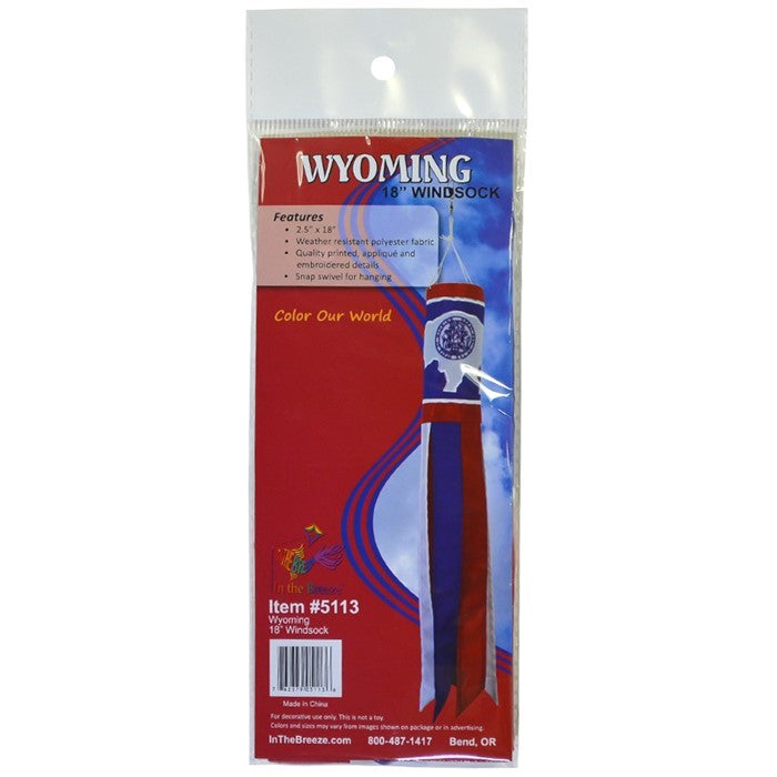 Wyoming 18 inch windsock featuring colorful patterns and six fluttering tails, displayed outdoors in a breezy environment.