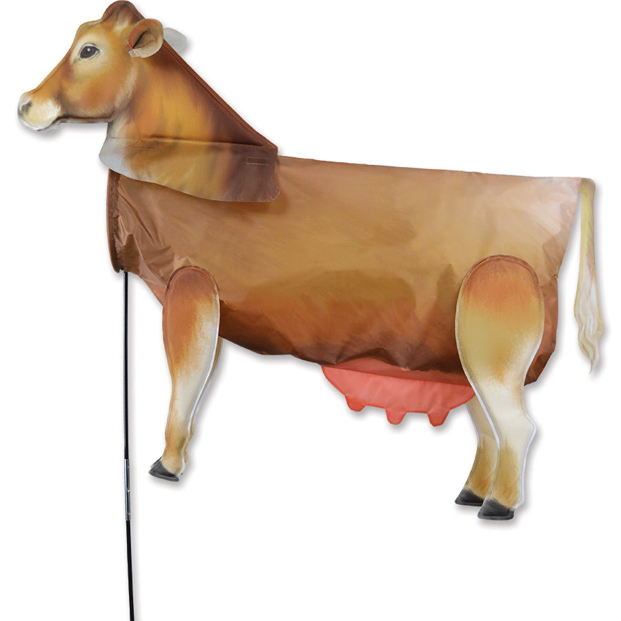 XL Windicator weather vane with a playful brown cow design, prominently displayed outdoors on a sturdy pole, moving naturally with the wind.