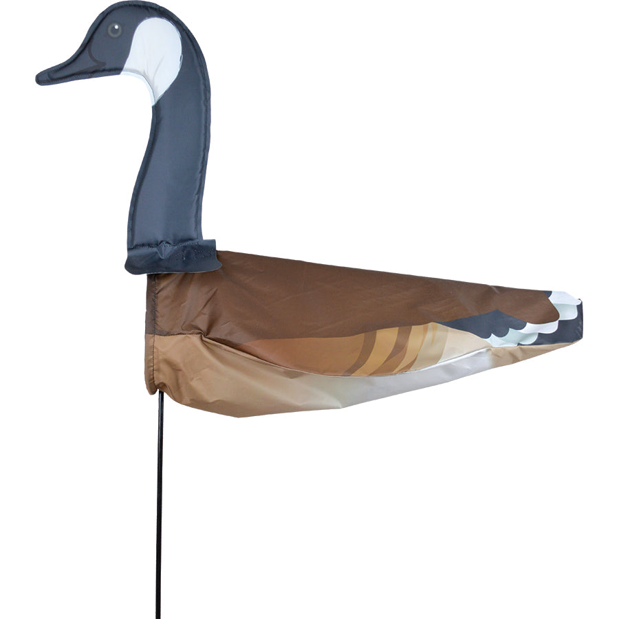 XL Windicator Weather Vane featuring a Canada Goose design on a fiberglass pole, inflating with the wind, displayed in a vibrant garden setting.