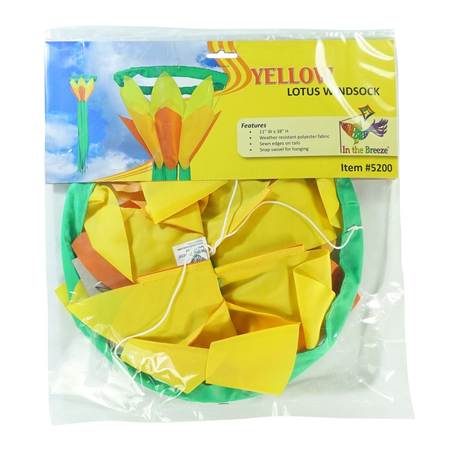 Colorful Yellow 38-Inch Lotus Flower Windsock featuring vibrant yellow and orange petals with green tails, displayed outdoors in a garden setting.
