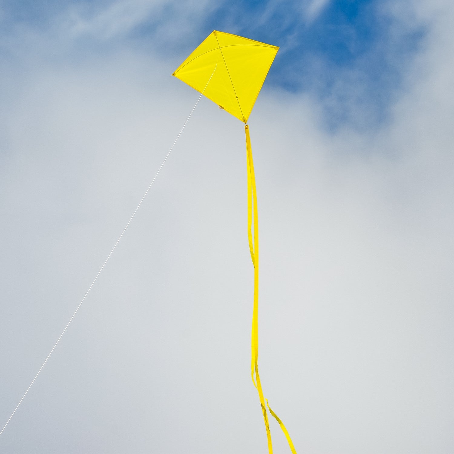 Capturing the essence of fun in the skies, the Yellow Colorfly 30" Diamond Kite boasts a bright yellow design with three coordinating tails, perfect for outdoor adventures.