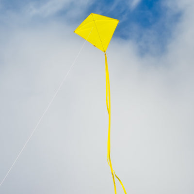 Capturing the essence of fun in the skies, the Yellow Colorfly 30" Diamond Kite boasts a bright yellow design with three coordinating tails, perfect for outdoor adventures.
