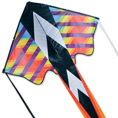 Zephyr Kite - Rainbow Geometric design, 64x165 inches, soaring in a clear blue sky with a picturesque landscape below.