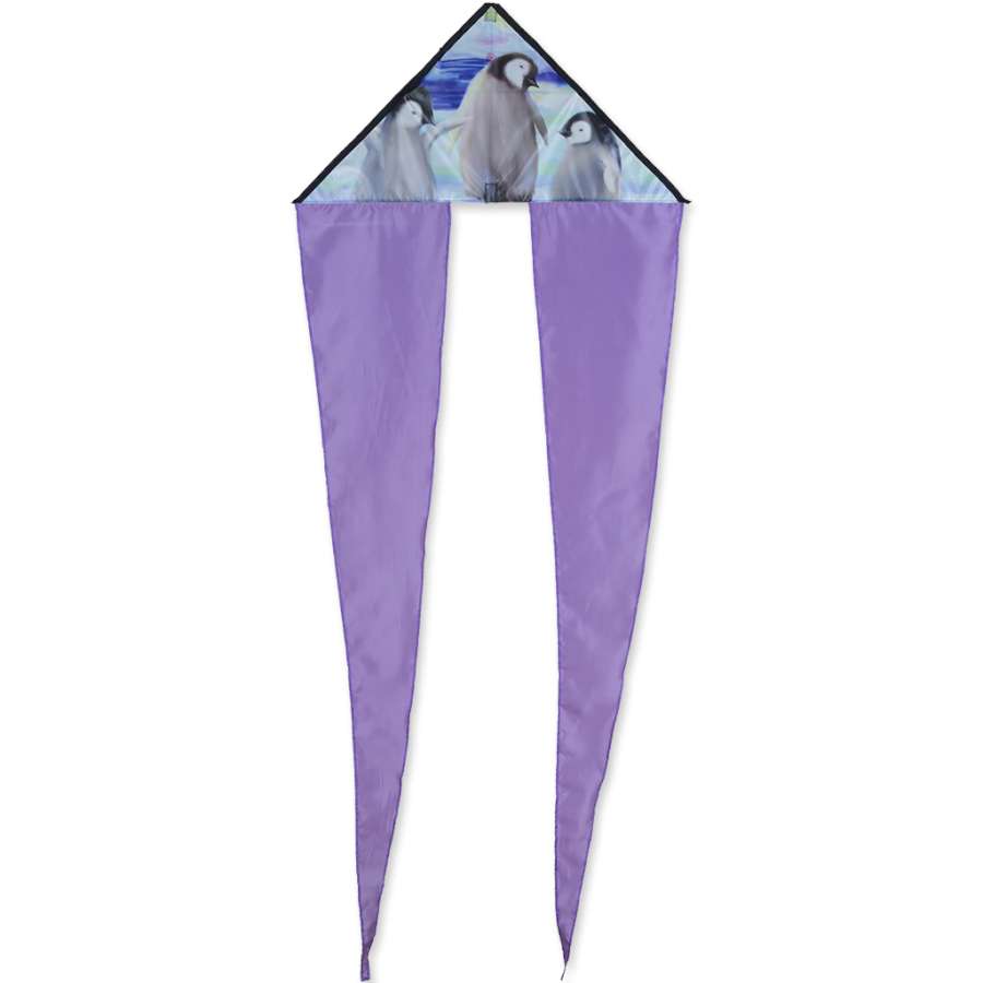 Zippy Flo-Tail Delta Kite featuring penguin design, soaring high in the sky, showcasing long colorful tails against a blue backdrop.